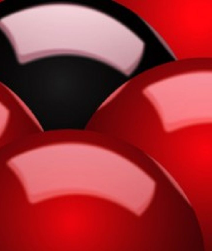 One black ball standing out among red ones